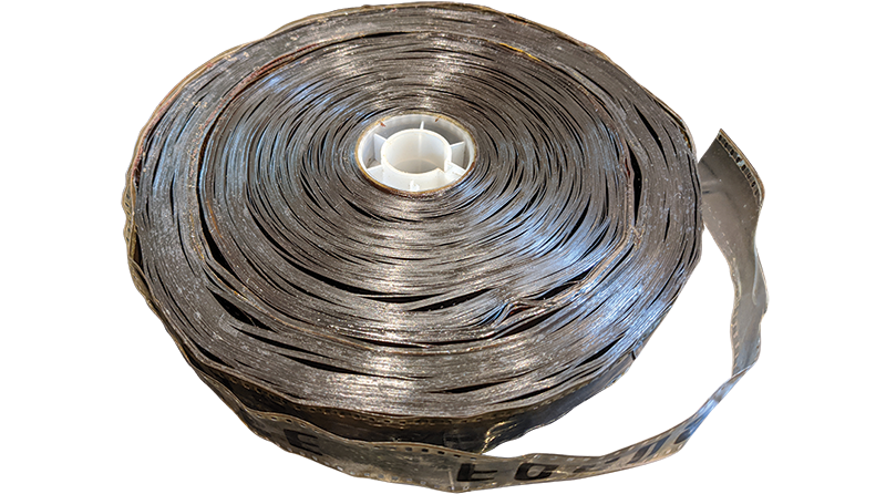 Most of the film base of Dharmasena Pathiraja’s Bambaru Avith had softened and the emulsion had become sticky. Warpage and shrinkage were observed in every reel with numerous adhesive stains and perforation tears. Courtesy of Asian Film Archive.